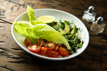 Healthy leaf salad with avocado