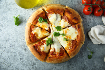 Homemade pizza with mozzarella cheese