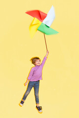 Poster banner collage of little man boy travel air toy wind mill isolates on yellow color background