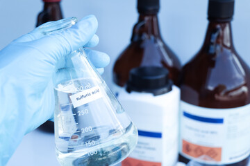 sulfuric acid in glass, chemical in the laboratory