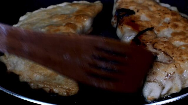 Pasties filling meat or cheburek fried.