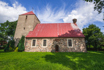 Fototapeta premium Church of Elevation of the Holy Cross in Kartno village, West Pomerania region of Poland
