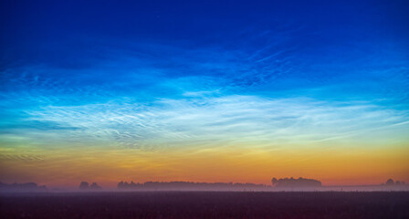 Night shining - Noctilucent clouds at night, panorama