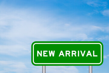 Green color transportation sign with word new arrival on blue sky with white cloud background