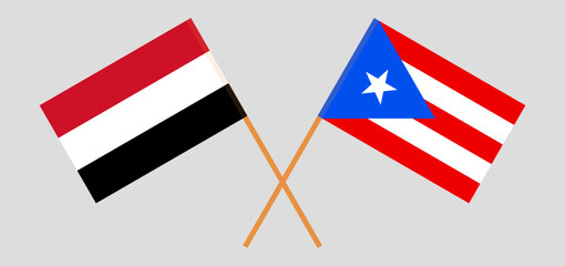 Crossed flags of Yemen and Puerto Rico. Official colors. Correct proportion