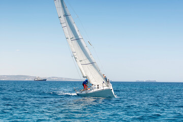 Yacht in open sea during sailing regatta - obrazy, fototapety, plakaty