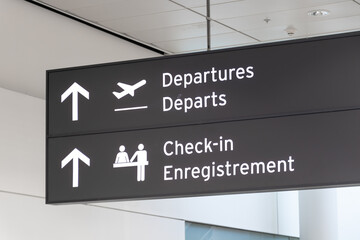 Departures and Check-in Airport Sign (English, French)