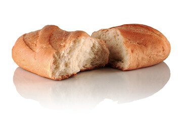 A loaf of white bread broken into two parts
