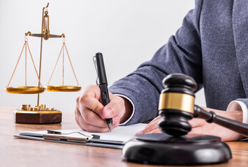 Judges hammer and legal advice figures on the table