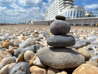 Stone balance rocks on pebble beach in St leonards on sea, Hastings, East Sussex UK