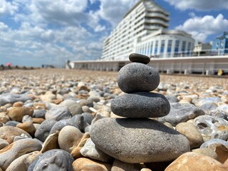 Stone balance rocks on pebble beach in St leonards on sea, Hastings, East Sussex UK