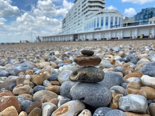 Stone balance rocks on pebble beach in St leonards on sea, Hastings, East Sussex UK