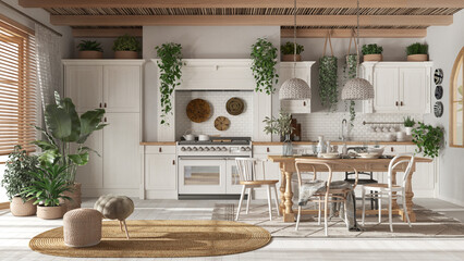 Wooden country kitchen in white and beige tones.Dining table, carpet and appliances. Scandinavian boho interior design
