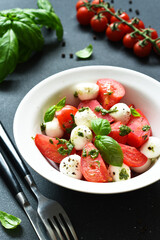 Italian appetizer caprese. Classic caprese salad with tomatoes and mozzarella
