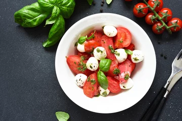 Gordijnen Italian appetizer caprese. Classic caprese salad with tomatoes and mozzarella © zefirchik06