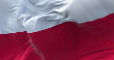 Close-up view of the Poland national flag waving in the wind