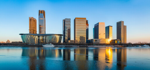 Aerial shot of city high-rise in the evening