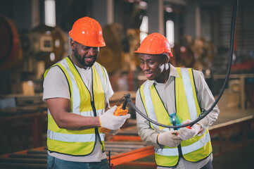 Team African American Black man afro worker in factory steel metal production