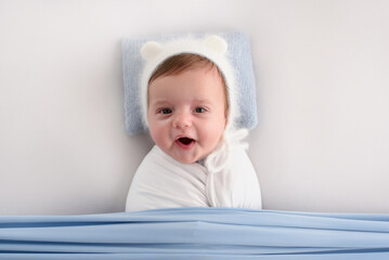Beautiful newborn baby laughing