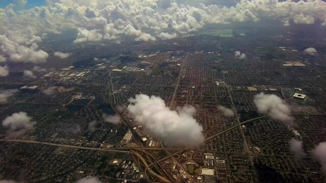 Aerial video Miami Hard Rock Stadium seen from above the clouds