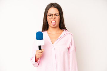 hispanic pretty woma with cheerful and rebellious attitude, joking and sticking tongue out....