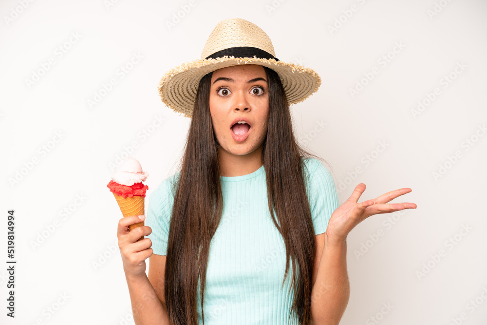 Wall mural hispanic pretty woma feeling angry, annoyed, rebellious and aggressive. ice cream and summer concept