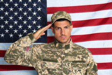 Soldier in uniform against United states of America flag