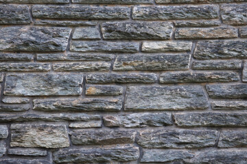 gray brick wall old fieldstones texture background rough stone building blocks
