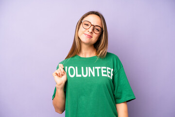 pretty caucasian woman looking arrogant, successful, positive and proud. volunteer concept