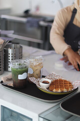 person preparing food in restaurant