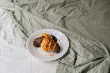 Crispy croissants on the bed. 