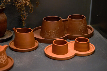 Obraz na płótnie Canvas A set of purple clay pots for traditional Chinese tea art