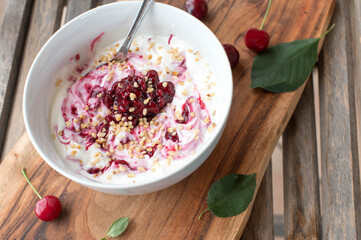 Protein breakfast with greek yogurt, sour cherry compote and roasted nuts