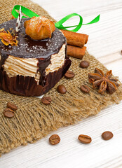 Caramel cake, mousse dessert on burlap.