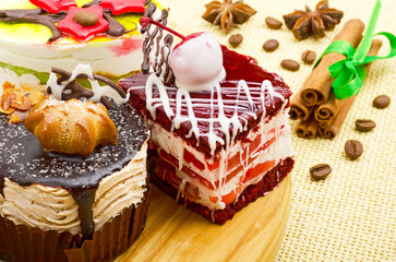Delicious cakes, a treat on a wooden board.