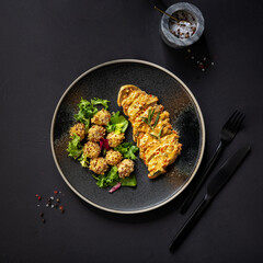 chicken with sauce, lettuce and quinoa