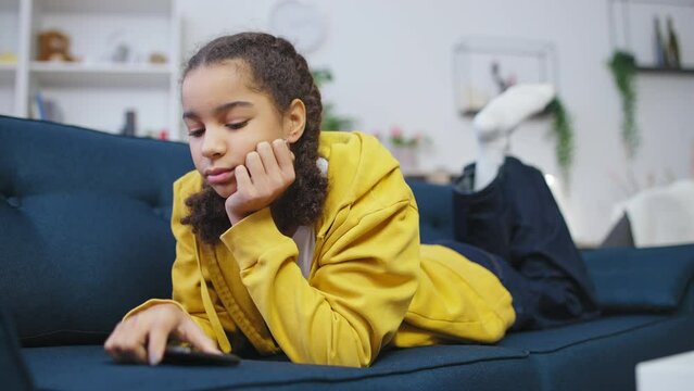 Black schoolgirl feeling peer pressure, problems in school, bullying victim