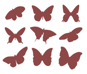 Set of silhouettes of nine beautiful flying butterflies