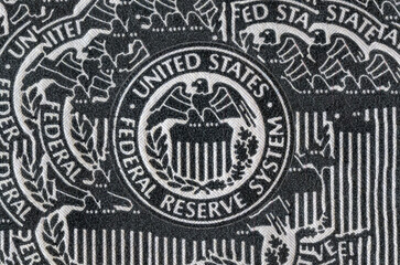 Distressed Federal Reserve System seal. The Fed's responsibilities include setting interest rates, managing the money supply, and regulating financial markets.