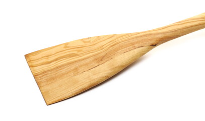 Close up empty new wooden spoon, olive tree isolated on white 