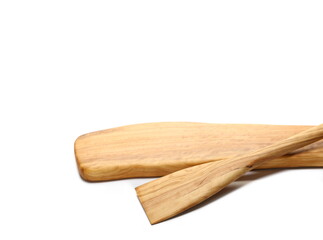 Wooden chopping board from olive wood and wooden spoon isolated on white, side view  