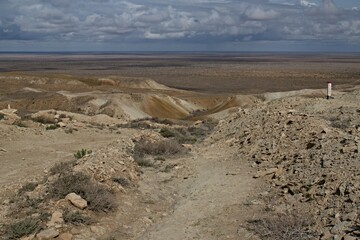 Fototapeta na wymiar A view of the ecological disaster, the Dry Aral Sea, from the Ustyurt Plateau. Karakalpakstan. Uzbekistan