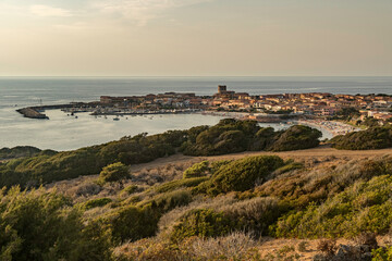 Isola Rossa from afar at sunset on Sardinia, italy