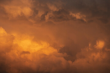 Beautiful sunset sky with amazing orange clouds.