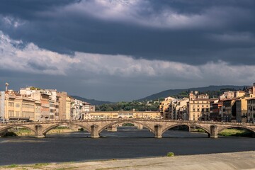 View of the Arno river in Florence and the Pescaia di Santa Rosa