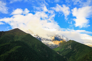 clouds over the high mountains of himalaya