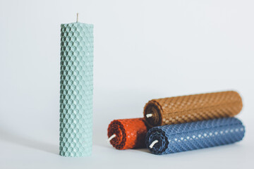 Wax decorative candles. Honeycomb candles. Candles on a clean background