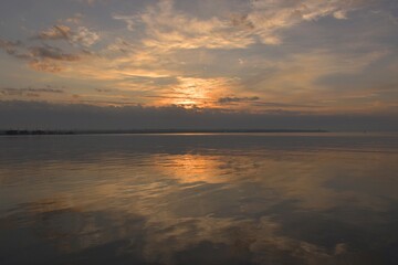 Walk at dawn along the embankment of the city of Kerch, Russia, seascape of a summer morning, the concept of travel and recreation.