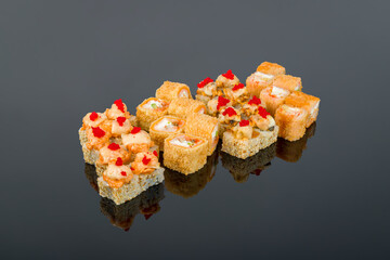 set of rolls on black with reflection