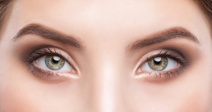 Beautiful eyes of a woman close-up. Makeup and healthy clear skin. professional makeup concept
